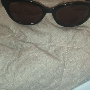 Gucci Black Oval Women's Sunglasses with Brown Lenses